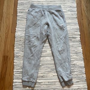 Nike jogger pants. Cuffed at the bottom